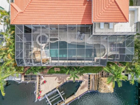 JUST WOW!! Experience Luxury! Gulf Access, Pool & Spa, Dock, Tiki- Villa Waterfront Wonderland